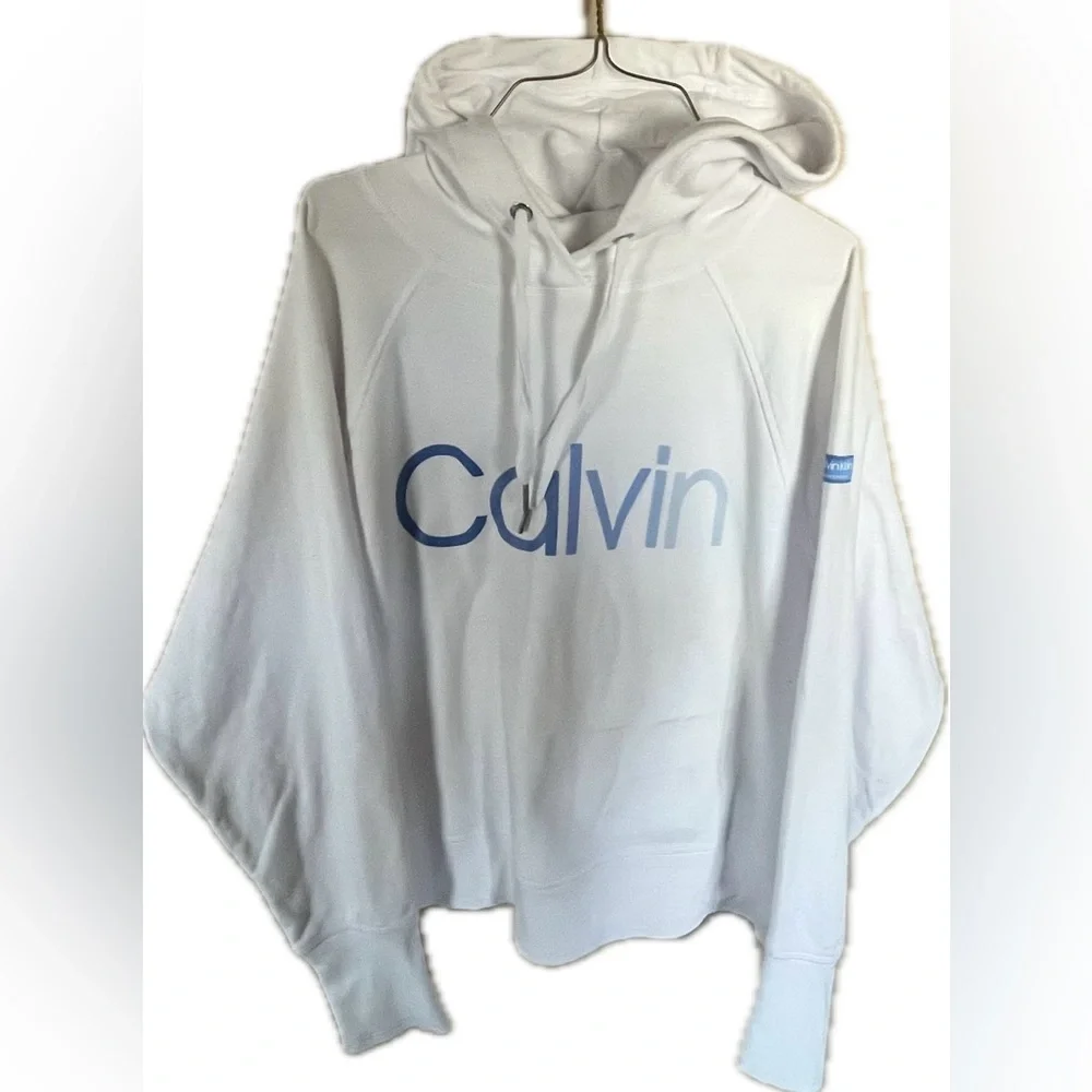 Calvin Klein hooded white sweatshirt. Women’s size Medium